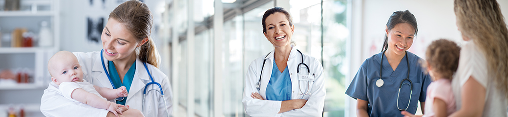 Medical doctor holding a baby